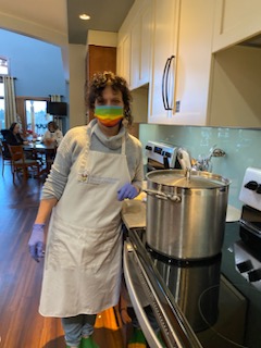 alt="Shelley Friss cooking soup at the Ronald McDonald House in Red Deer"
